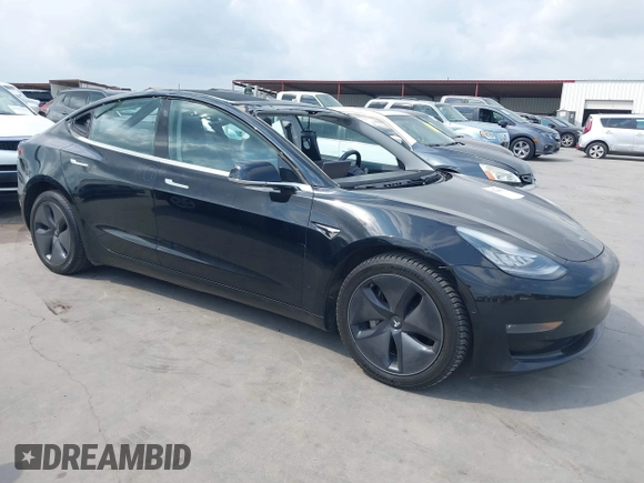 2018 Tesla Model 3 Long Range Battery z VIN 5YJ3E1EB3JF178812, wystawiony jako IAAI lot #42124838 z przebiegiem 124 229 mil mil oraz . Historia ofert i sprzedaży dostępna na DreamBid. Obrazek 1.