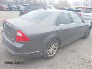 2011 Ford Fusion SEL with VIN 3FAHP0JG2BR232778, listed as a IAAI auction lot 42088562 with 186,584 mi miles. Bid and sale history available at carsss.com. Image 4.