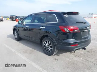 2015 Mazda CX-9 Grand Touring z VIN JM3TB2DA1F0456773, wystawiony jako IAAI lot #42257555 z przebiegiem 152 890 mil mil oraz . Historia ofert i sprzedaży dostępna na DreamBid. Obrazek 3.