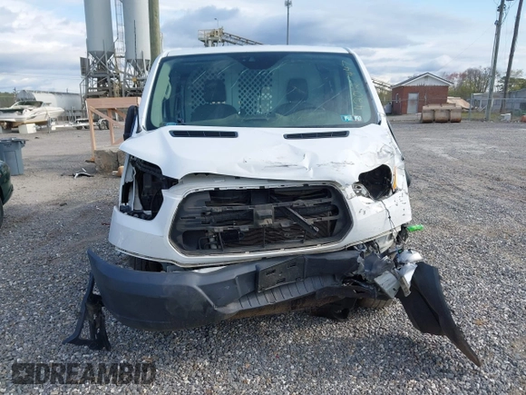 2016 Ford Transit Cargo with VIN 1FTYR1ZM2GKA38963, listed as a IAAI auction lot 42027447 with 70,659 mi miles and . Bid and sale history available at DreamBid. Image 12.