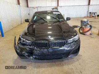 2022 BMW 3 Series M340i xDrive with VIN 3MW5U9J06N8C77498, listed as a Copart auction lot 50289925 with 39,537 mi miles and Salvage Title. Bid and sale history available at carsss.com. Image 5.