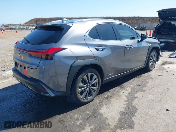2021 Lexus UX 250h F Sport z VIN JTHR9JBH3M2052706, wystawiony jako IAAI lot #42321784 z przebiegiem 23 290 mil mil oraz . Historia ofert i sprzedaży dostępna na DreamBid. Obrazek 4.