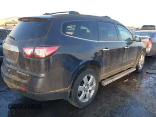 2016 Chevrolet Traverse LT with VIN 1GNKRGKD9GJ301823, listed as a IAAI auction lot 41374254 with 145,235 mi miles and . Bid and sale history available at DreamBid. Image 4.