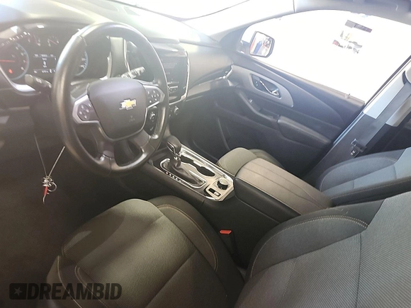 2021 Chevrolet Traverse LT Cloth with VIN 1GNEVMKWXMJ220477, listed as a IAAI auction lot 42842579 with 62,180 mi miles and . Bid and sale history available at DreamBid. Image 2.