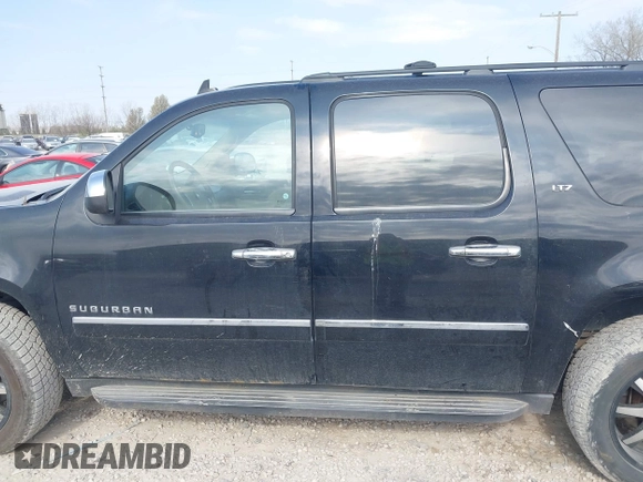 2011 Chevrolet Suburban LTZ with VIN 1GNSKKE39BR303754, listed as a IAAI auction lot 42070374 with 207,824 mi miles and . Bid and sale history available at DreamBid. Image 14.