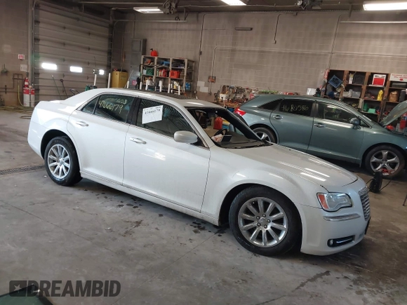2014 Chrysler 300 with VIN 2C3CCAAGXEH217715, listed as a IAAI auction lot 41666179 with 145,744 mi miles and . Bid and sale history available at DreamBid. Image 1.