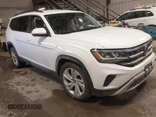 2023 Volkswagen Atlas SE z VIN 1V2HR2CA6PC510823, wystawiony jako IAAI lot #41576865 z przebiegiem 22 991 mil mil oraz . Historia ofert i sprzedaży dostępna na DreamBid. Obrazek 1.