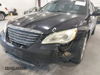 2011 Chrysler 200 Touring with VIN 1C3BC1FB5BN592729, listed as a IAAI auction lot 42234296 with 139,306 mi miles and . Bid and sale history available at DreamBid. Image 6.