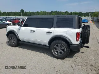 2023 Ford Bronco z VIN 1FMDE5BH2PLB20499, wystawiony jako Copart lot #62211165 z przebiegiem 28 372 mil mil oraz Szkoda całkowita • Salvage title. Historia ofert i sprzedaży dostępna na DreamBid. Obrazek 2.