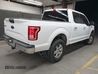 2015 Ford F-150 XLT with VIN 1FTEW1EGXFFB84269, listed as a IAAI auction lot 42565801 with 140,719 mi miles and . Bid and sale history available at DreamBid. Image 4.