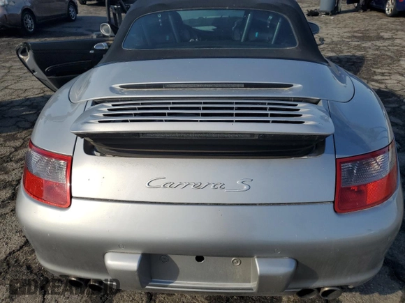 2005 Porsche 911 Carrera S z VIN WP0CB29995S765398, wystawiony jako Copart lot #42413555 z przebiegiem 32 993 mil mil oraz Szkoda całkowita • Salvage title. Historia ofert i sprzedaży dostępna na DreamBid. Obrazek 11.