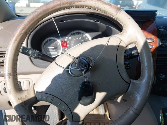 2004 Toyota Sienna XLE with VIN 5TDBA22C04S002407, listed as a IAAI auction lot 41385381 with 220,914 mi miles and . Bid and sale history available at DreamBid. Image 11.
