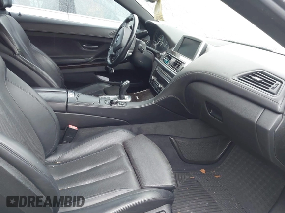 2012 BMW 6 Series 650i with VIN WBALZ3C5XCDL71723, listed as a IAAI auction lot 42204721 with 132,912 mi miles and . Bid and sale history available at carsss.com. Image 5.