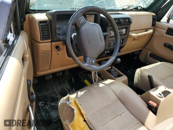1999 Jeep Wrangler Sport with VIN 1J4FY19S0XP402688, listed as a Copart auction lot 58968125 with 211,910 mi miles and Salvage title. Bid and sale history available at DreamBid. Image 8.