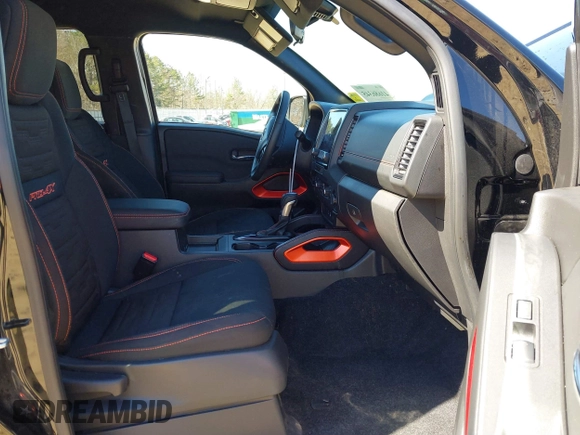 2024 Nissan Frontier Pro-4X with VIN 1N6ED1EK3RN654112, listed as a IAAI auction lot 41686345 with 14,893 mi miles and . Bid and sale history available at DreamBid. Image 5.