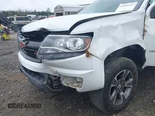 2020 Chevrolet Colorado 4WD Z71 with VIN 1GCGTDEN6L1228309, listed as a IAAI auction lot 41865357 with 100,560 mi miles and . Bid and sale history available at DreamBid. Image 6.