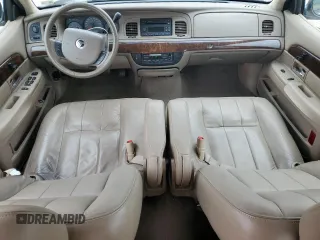2005 Mercury Grand Marquis LS Premium z VIN 2MEFM75W15X660639, wystawiony jako Copart lot #56580605 z przebiegiem 149 136 mil mil oraz Szkody całkowita. Historia ofert i sprzedaży dostępna na DreamBid. Obrazek 8.