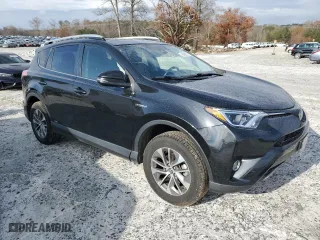 2016 Toyota RAV4 Hybrid XLE with VIN JTMRJREV2GD059101, listed as a Copart auction lot 69439222 with 74,915 mi miles. Bid and sale history available at carsss.com. Image 4.