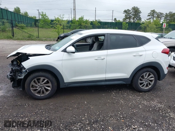 2018 Hyundai Tucson SE z VIN KM8J2CA41JU807280, wystawiony jako IAAI lot #42301977 z przebiegiem 62 415 mil mil oraz . Historia ofert i sprzedaży dostępna na DreamBid. Obrazek 14.