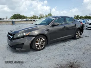 2013 Kia Optima EX с VIN 5XXGN4A72DG188821, выставлен на аукционе Copart как лот 65546495 с пробегом 187 286 миль миль и Списание • Salvage title. История ставок и продаж доступна на DreamBid. Изображение 1.