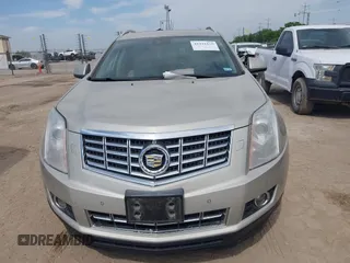 2013 Cadillac SRX Performance Collection with VIN 3GYFNDE34DS634099, listed as a IAAI auction lot 41931125 with 134,318 mi miles and . Bid and sale history available at carsss.com. Image 12.