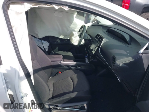 2021 Toyota Prius L Eco with VIN JTDKAMFUXM3144845, listed as a IAAI auction lot 41358306 with Not provided miles and . Bid and sale history available at DreamBid. Image 5.
