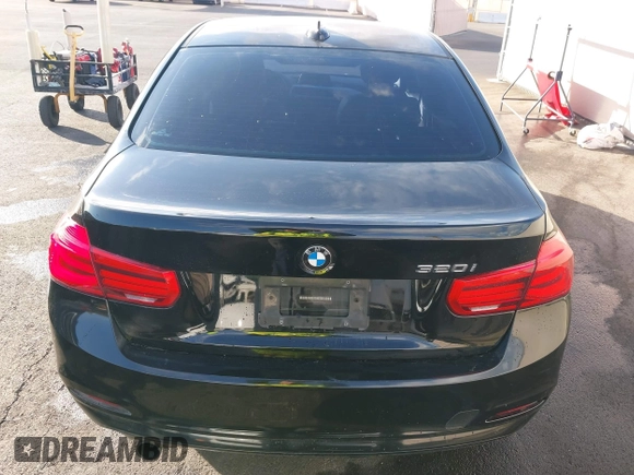 2017 BMW 3 Series 320i with VIN WBA8E1G50HNU14516, listed as a IAAI auction lot 41433532 with 119,742 mi miles. Bid and sale history available at carsss.com. Image 16.