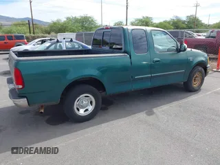 2000 Ford F-150 XL with VIN 2FTRX17W3YCA66727, listed as a IAAI auction lot 42639201 with 42,094 mi miles and . Bid and sale history available at DreamBid. Image 4.