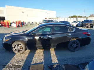 2018 Nissan Altima 2.5 SV with VIN 1N4AL3AP0JC206319, listed as a IAAI auction lot 41296685 with 96,103 mi miles. Bid and sale history available at carsss.com. Image 15.