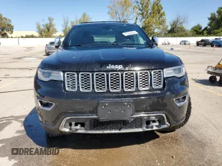 2017 Jeep Grand Cherokee Overland with VIN 1C4RJFCTXHC778491, listed as a Copart auction lot 73944594 with 99,235 mi miles and Clean Title. Bid and sale history available at carsss.com. Image 5.