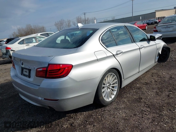 2011 BMW 5 Series 535i xDrive with VIN WBAFU7C54BC874199, listed as a IAAI auction lot 42111558 with 181,002 mi miles. Bid and sale history available at carsss.com. Image 4.