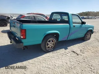 1996 Dodge Dakota with VIN 1B7FL26X9TW706385, listed as a Copart auction lot 77003174 with 146,228 mi miles and Salvage Title. Bid and sale history available at carsss.com. Image 3.