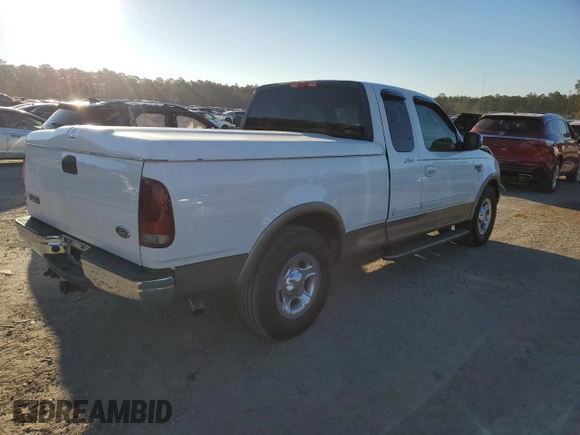 2003 Ford F-150 XL with VIN 1FTRX17L93NA89972, listed as a Copart auction lot 85790884 with 253,763 mi miles and Salvage Title. Bid and sale history available at carsss.com. Image 3.