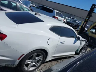 2019 Chevrolet Camaro 1LS with VIN 1G1FB1RX5K0130443, listed as a IAAI auction lot 41586492 with 122,538 mi miles and . Bid and sale history available at carsss.com. Image 14.