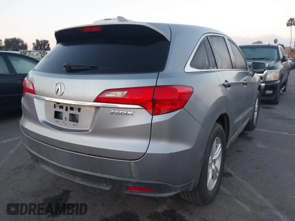 2014 Acura RDX with VIN 5J8TB3H3XEL005947, listed as a IAAI auction lot 41999309 with 133,531 mi miles and . Bid and sale history available at DreamBid. Image 4.
