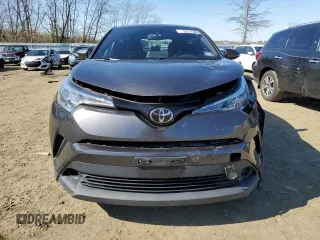 2019 Toyota C-HR XLE z VIN NMTKHMBX4KR084471, wystawiony jako Copart lot #52575985 z przebiegiem 54 578 mil mil oraz Szkoda całkowita • Salvage title. Historia ofert i sprzedaży dostępna na DreamBid. Obrazek 5.