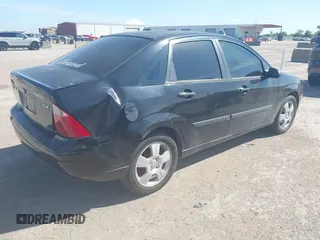 2005 Ford Focus S с VIN 1FAFP34N45W101548, выставлен на аукционе IAAI как лот 42607412 с пробегом 180 785 миль миль и . История ставок и продаж доступна на DreamBid. Изображение 4.