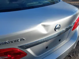 2016 Nissan Sentra S with VIN 3N1AB7AP0GY262977, listed as a IAAI auction lot 41901900 with 121,022 mi miles. Bid and sale history available at carsss.com. Image 6.