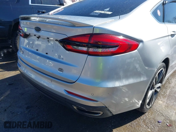 2019 Ford Fusion Titanium with VIN 3FA6P0D91KR187109, listed as a IAAI auction lot 41646320 with 107,125 mi miles. Bid and sale history available at carsss.com. Image 6.