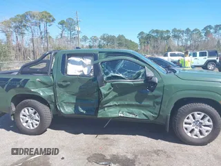2022 Nissan Frontier SV with VIN 1N6ED1EJ2NN632457, listed as a IAAI auction lot 41694079 with 64,506 mi miles and . Bid and sale history available at DreamBid. Image 13.