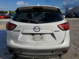 2014 Mazda CX-5 Sport with VIN JM3KE2BE5E0346882, listed as a Copart auction lot 45426995 with 209,435 mi miles and Clean Title. Bid and sale history available at carsss.com. Image 6.