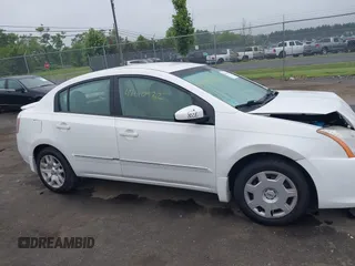 2012 Nissan Sentra S z VIN 3N1AB6APXCL636612, wystawiony jako IAAI lot #42610932 z przebiegiem 150 605 mil mil oraz . Historia ofert i sprzedaży dostępna na DreamBid. Obrazek 13.