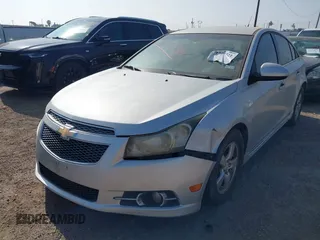 2012 Chevrolet Cruze 1LT with VIN 1G1PF5SC1C7354194, listed as a IAAI auction lot 41778721 with 215,865 mi miles and . Bid and sale history available at DreamBid. Image 2.