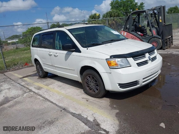 2010 Dodge Grand Caravan SE with VIN 2D4RN4DE5AR490306, listed as a IAAI auction lot 41944376 with 127,107 mi miles. Bid and sale history available at carsss.com. Image 1.