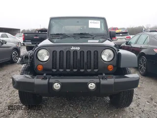 2012 Jeep Wrangler Sport z VIN 1C4AJWAG8CL262755, wystawiony jako IAAI lot #41566823 z przebiegiem 164 135 mil mil oraz . Historia ofert i sprzedaży dostępna na DreamBid. Obrazek 13.