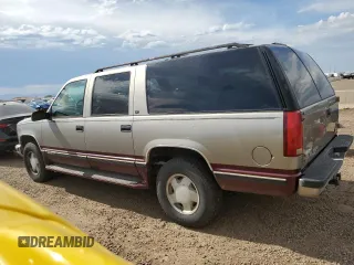 1998 GMC Suburban with VIN 1GKFK16RXWJ721305, listed as a Copart auction lot 64112165 with 197,756 mi miles and Clean title. Bid and sale history available at DreamBid. Image 2.