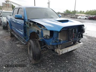 2017 Toyota Tacoma SR5 z VIN 3TMCZ5AN3HM059269, wystawiony jako IAAI lot #42231882 z przebiegiem 127 092 mil mil oraz . Historia ofert i sprzedaży dostępna na DreamBid. Obrazek 1.
