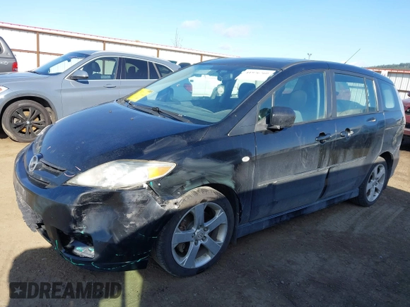2007 Mazda 5 Touring with VIN JM1CR293970135693, listed as a IAAI auction lot 41976260 with 211,978 mi miles and . Bid and sale history available at carsss.com. Image 2.