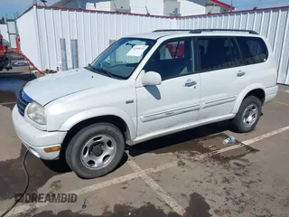 2002 Suzuki XL7 Standard z VIN JS3TX92V324125187, wystawiony jako IAAI lot #42195273 z przebiegiem 243 050 mil mil oraz . Historia ofert i sprzedaży dostępna na DreamBid. Obrazek 2.