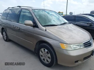 2004 Honda Odyssey EX with VIN 5FNRL18674B033162, listed as a IAAI auction lot 42632829 with 167,128 mi miles and . Bid and sale history available at DreamBid. Image 1.